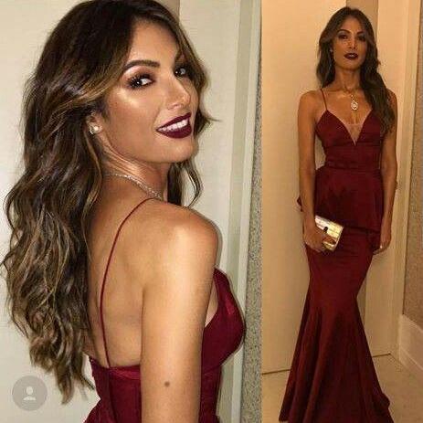 Model In Green Silk Dress Summer Fashion Woman In Spaghetti Strap Satin  Evening Gown Over White Elegant Lady With Curly Long Hair Style Happy  Smiling Over Gray Background Stock Photo - Download